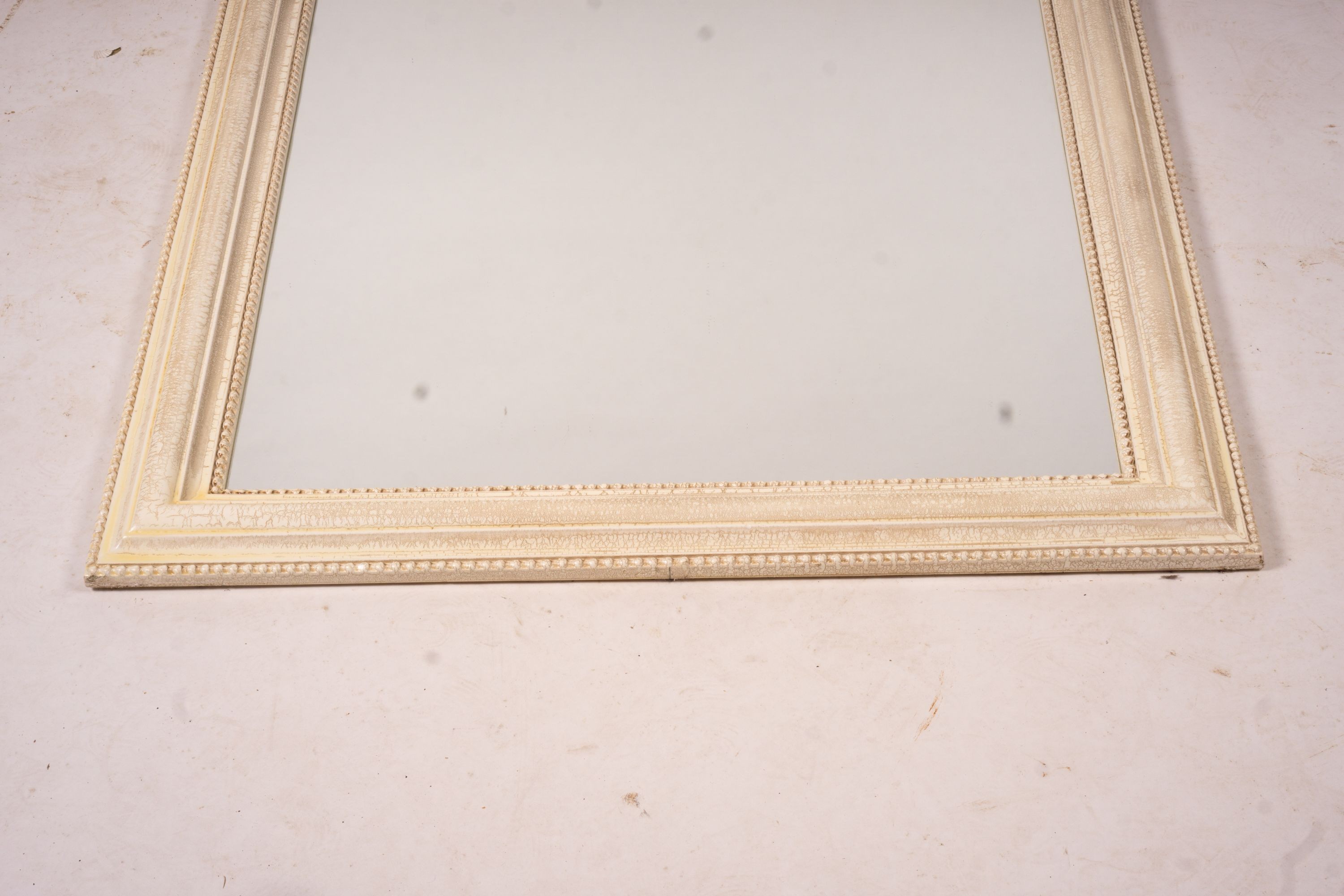 A Laura Ashley overmantel mirror, W.86cm H.110cm